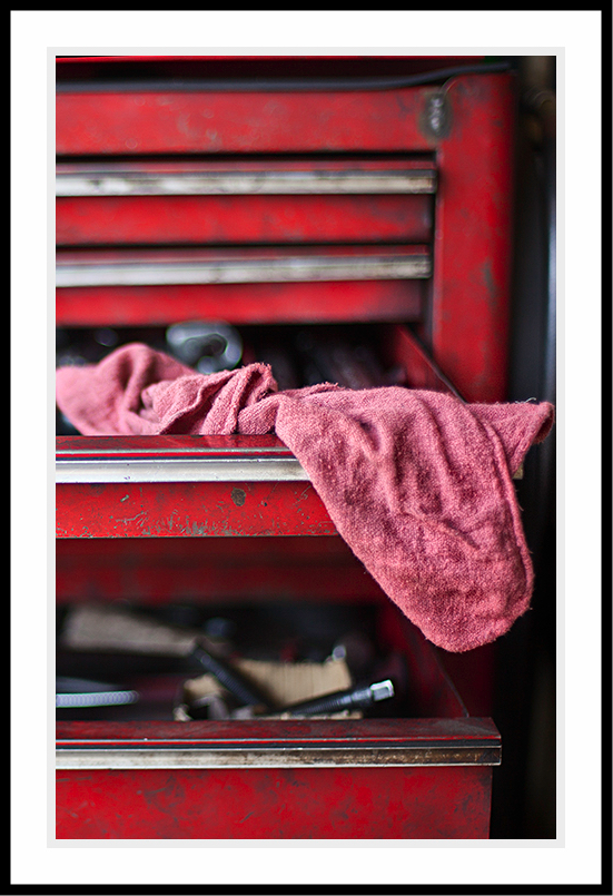 Rag hanging off a toolbox.